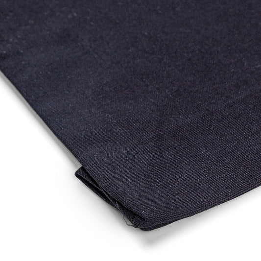 Close-up detail of black 220 g/m² cotton tote bag gusset and stitching