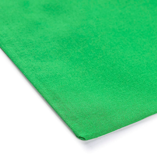 Detalle de cerca de una bolsa de tela verde claro con estampado personalizado, 140 g/m²