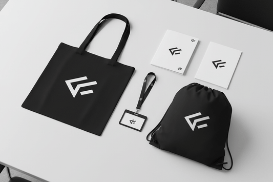 Black tote bag and drawstring bag with a printed logo, ready for an autumn event