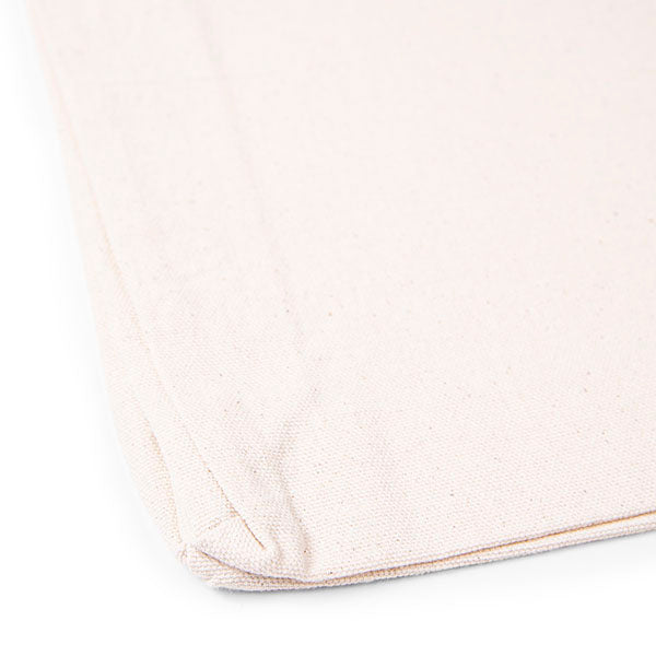Close-up detail of natural 220 g/m² horizontal cotton tote bag gusset and stitching