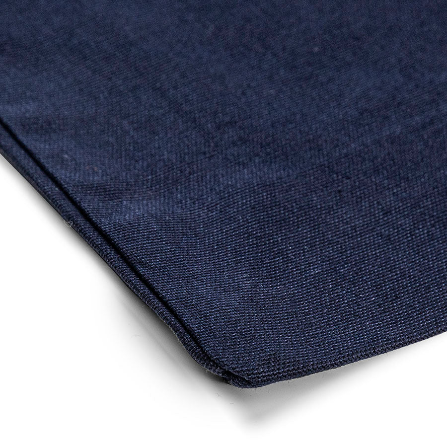 Close-up detail of navy blue 220 g/m² cotton tote bag gusset and stitching