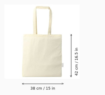 An off-white canvas tote bag with dimension markings showing a height of 42 cm (16.5 in) and a width of 38 cm (15 in) on a white background.