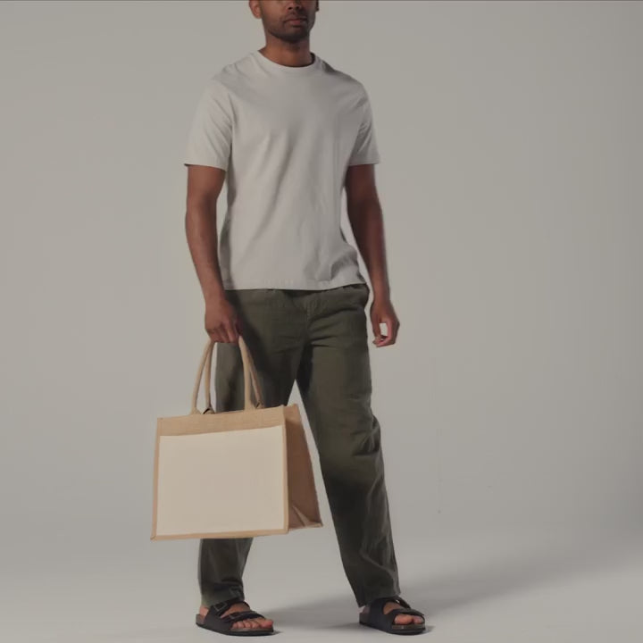 Video of the Natural Cotton Pocket Jute Shopper, 42 x 33 x 19 cm, showing the laminated jute body and cotton front pocket for custom logo printing